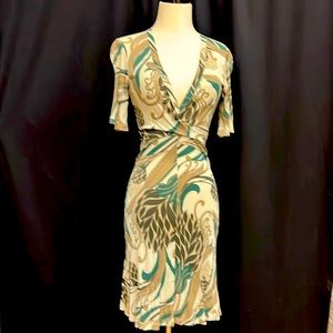 Cute cocktail dress with fun print. Secretly sexy.